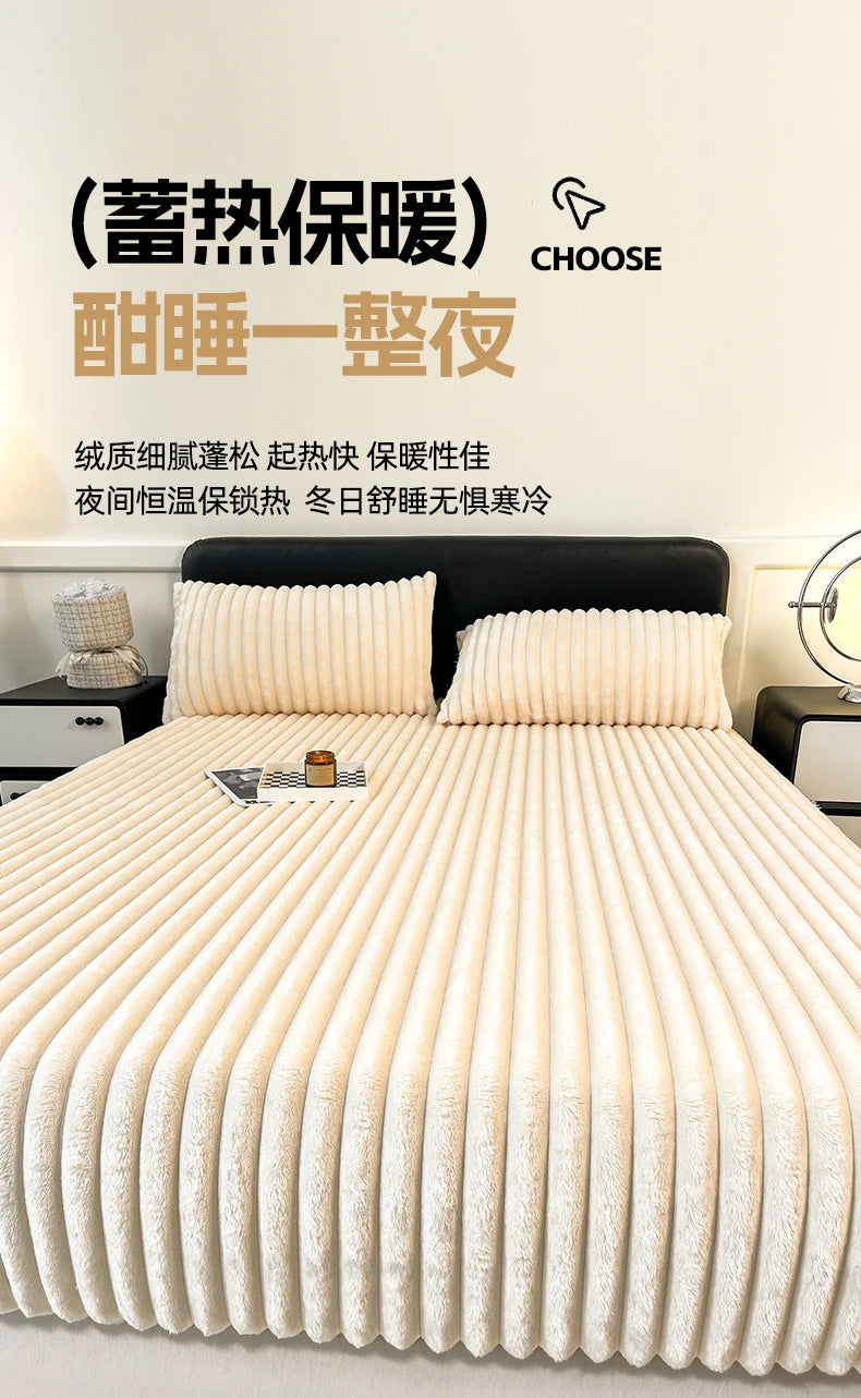 A close-up of thick, ribbed, cream-colored fitted bed sheets on a bed with white pillows.