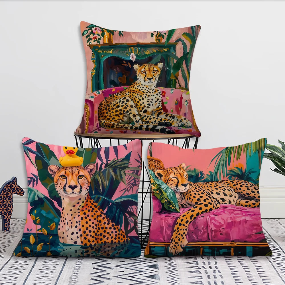 A decorative cushion cover featuring a cheetah print and tropical plant design on a pink background.