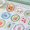 A collection of vintage botanical flower stickers featuring various colors and designs for journaling and scrapbooking.