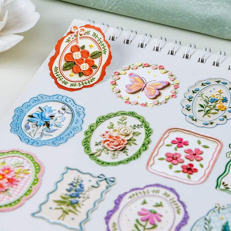 A collection of vintage botanical flower stickers featuring various colors and designs for journaling and scrapbooking.