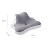 Gray ergonomic wedge pillow with white trim shown from the side and top view.