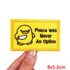 Yellow embroidered patch featuring a cartoon yellow duck with the text Peace was Never An Option