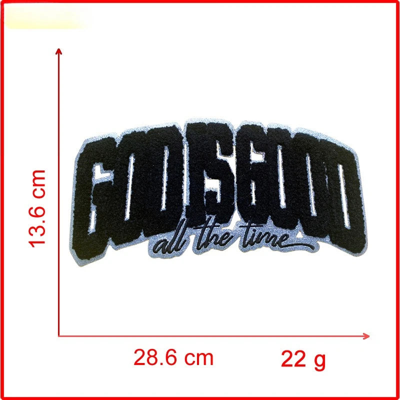Black embroidered text GODGOOD all the time on a white background with dimension measurements.