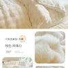 A fluffy white rabbit fleece duvet cover displayed on a bed, showing close-ups of the texture and light.