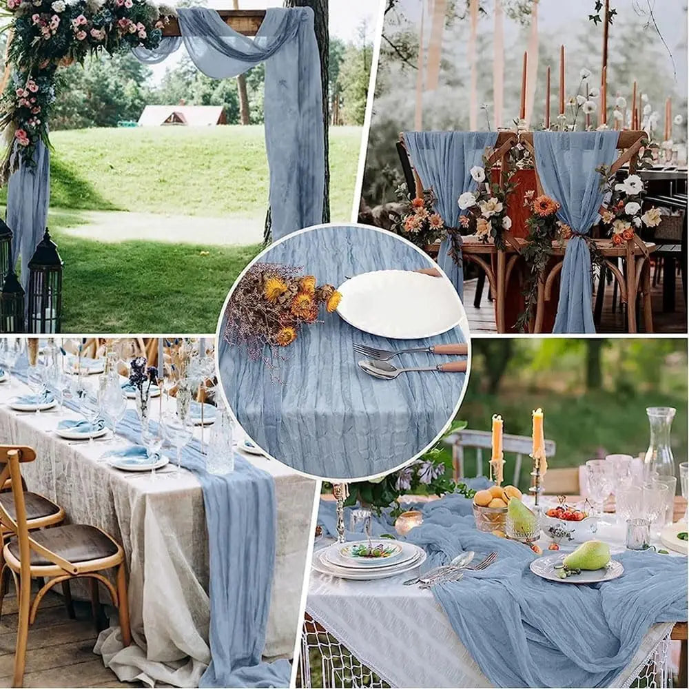 A rustic table setting featuring a blue cheesecloth runner, floral arrangements, and wooden chairs for boho decor.