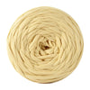A ball of light beige soft T-shirt yarn used for crochet