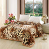 A plush mink fleece king size blanket with rose and peony floral pattern is displayed on a bed.