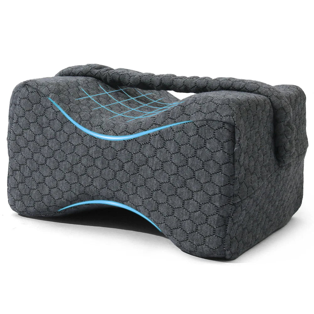 Gray memory foam knee pillow for side sleepers with adjustable straps