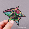 Embroidered horror movie patch featuring a stylized monster head in black and neon colors