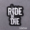 Black embroidered patch with white text READ OR DIE on a dark gray background