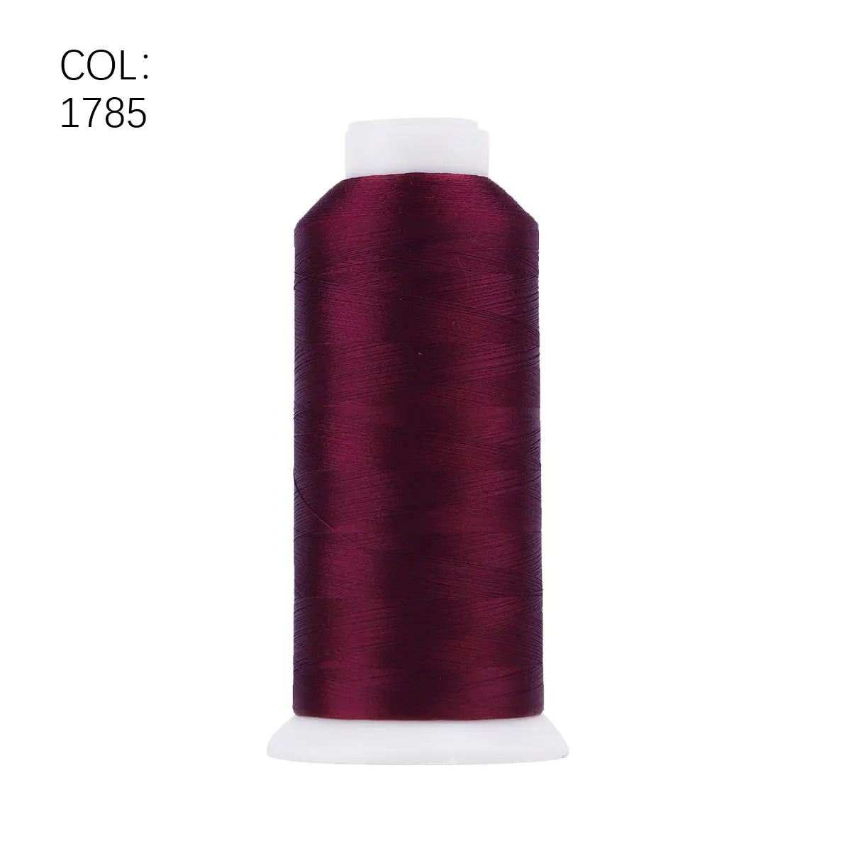 A roll of deep burgundy polyester embroidery thread with a white core.