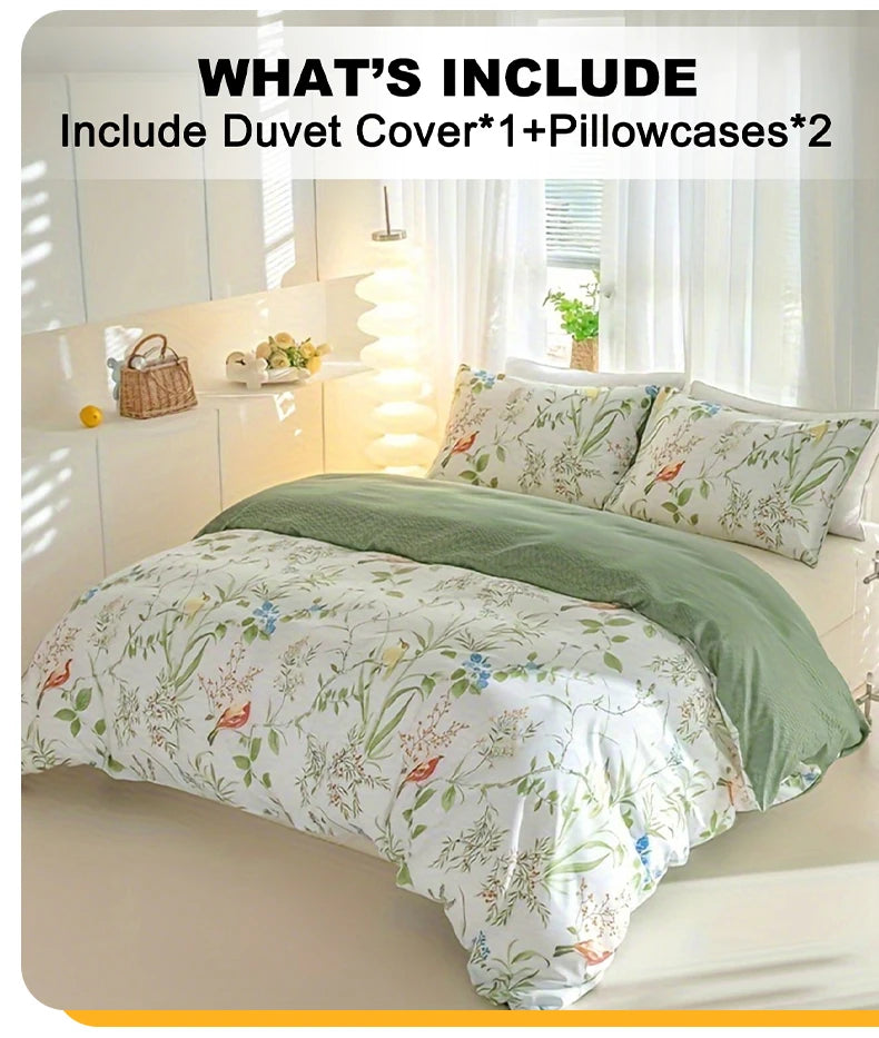 A leaf floral duvet cover set featuring white fabric with green and blue botanical patterns displayed on a bed.