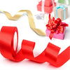 Red satin ribbon roll for crafts and gift wrapping shown in various rolls and a finished gift box.