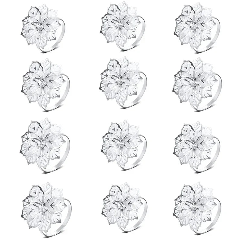 A set of elegant metal napkin rings for table decoration shown in various styles and sizes.