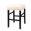 A black bar stool with a white upholstered seat and legs.