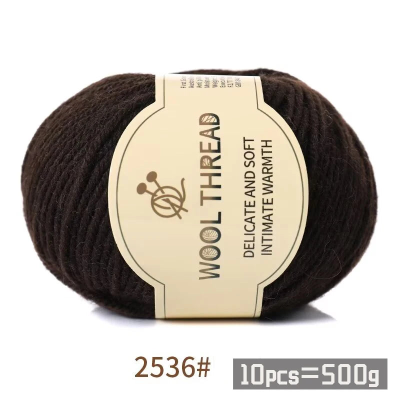 Dark brown wool thread skein labeled 2536 with the text Delicate and Soft Intimate Warmth