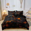 A black duvet cover featuring a geometric grid plaid pattern with warm orange accents on a bed.