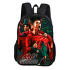 A black cartoon football sports backpack featuring a vibrant illustration of a soccer player.