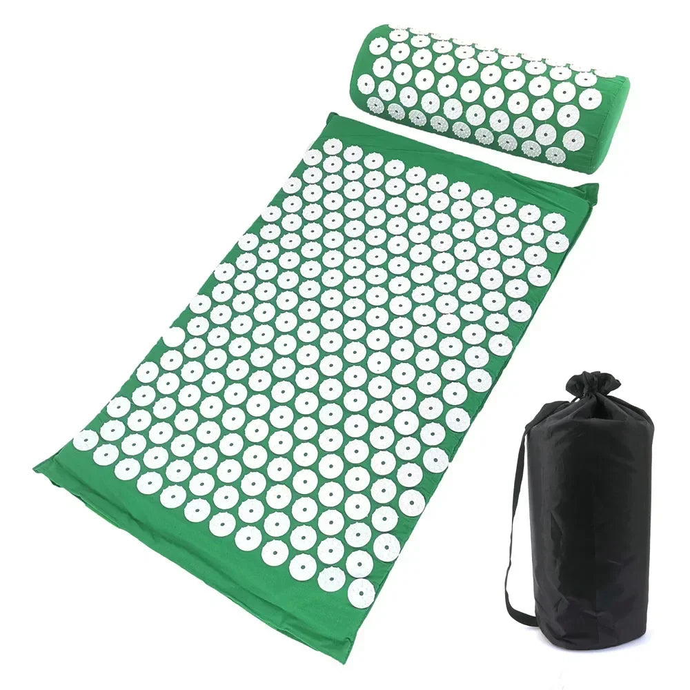 A mat and pillow set with a green fabric featuring a pattern of white circles for acupressure relief.