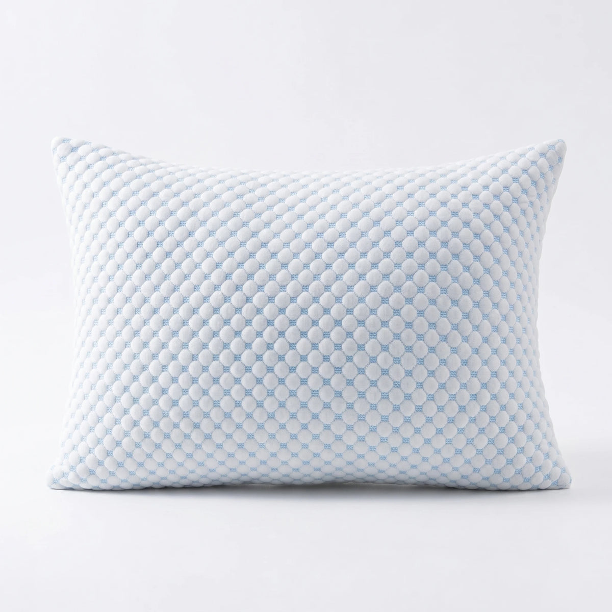 A light blue quilted memory foam pillow with a diamond pattern.