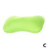 A lime green microbead neck pillow shown from the side.
