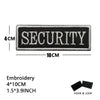 Black embroidered security patch measuring 4cm by 10cm with hook and loop backing