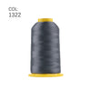 A spool of dark gray high tenacity polyester embroidery thread with a yellow core.