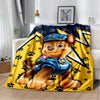 A cartoon dog plush wearing a blue and white uniform is featured on a yellow flannel throw blanket.