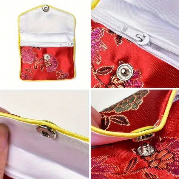 A set of multi-color silk brocade jewelry pouches featuring red and pink floral patterns.