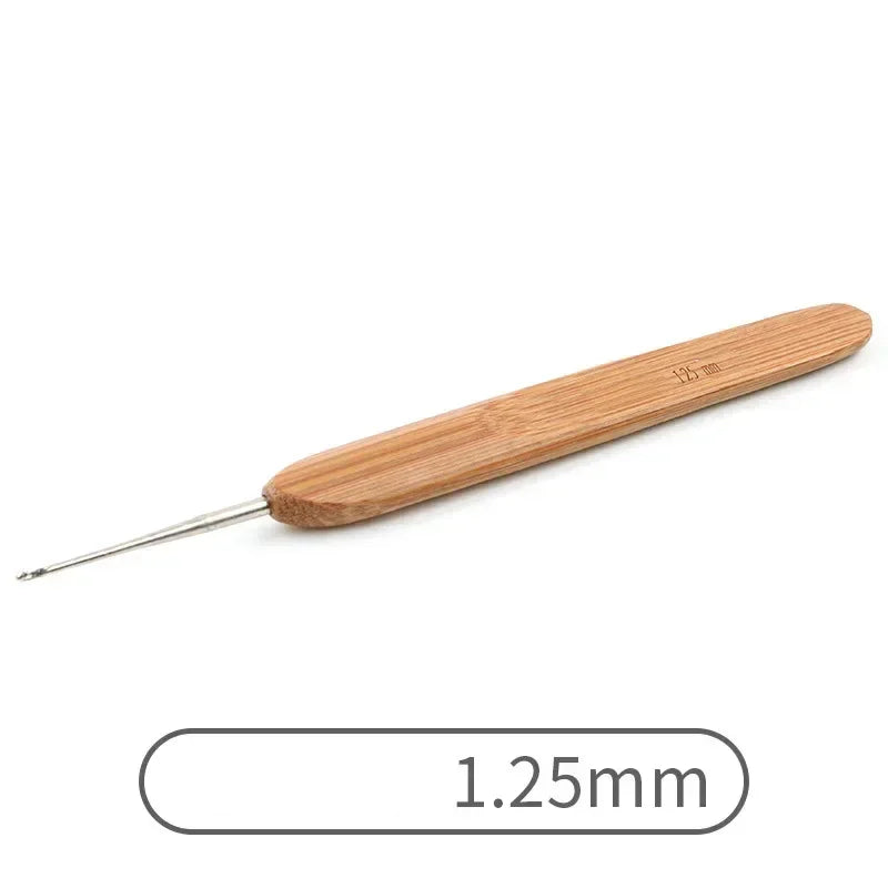A wooden bamboo crochet knitting needle with a 1.25mm tip.
