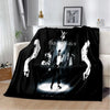 A black flannel throw blanket featuring a white graphic of Michael Jackson performing.