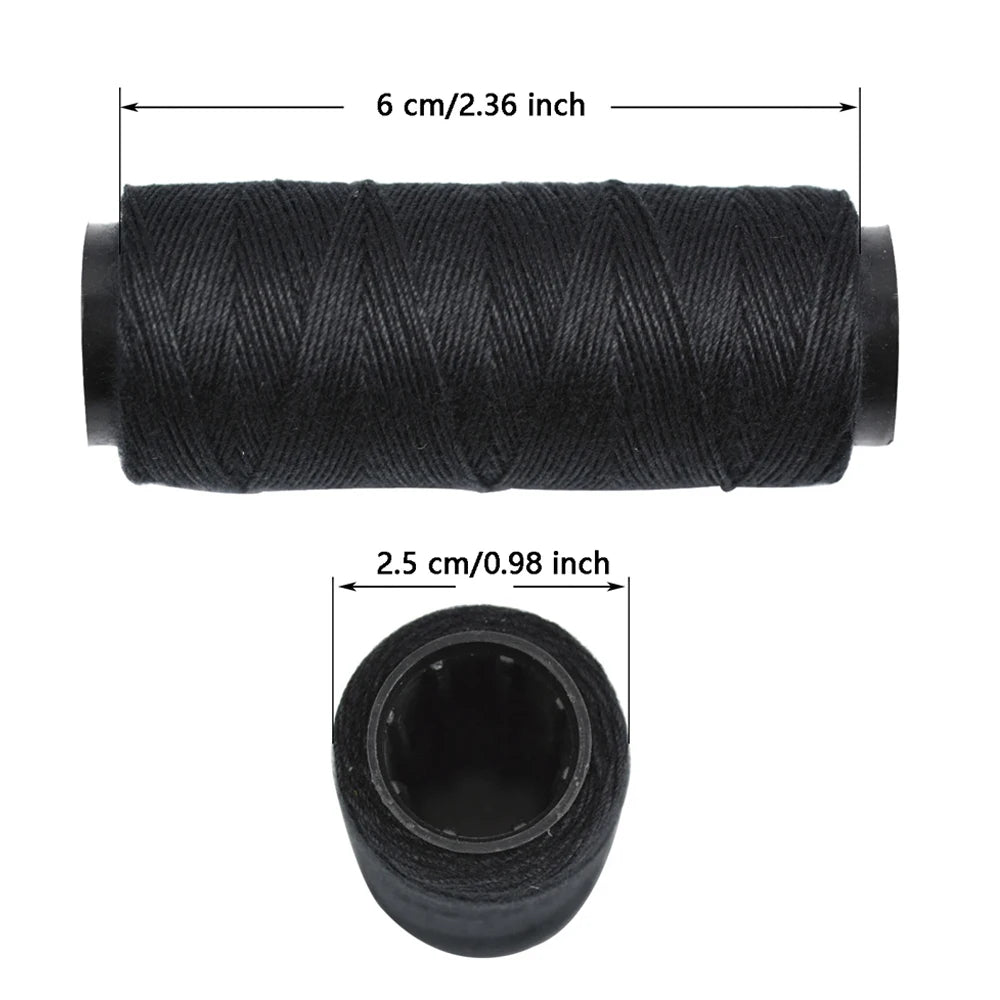 A roll of black sewing thread, 6 cm long, with a circular spool visible below.