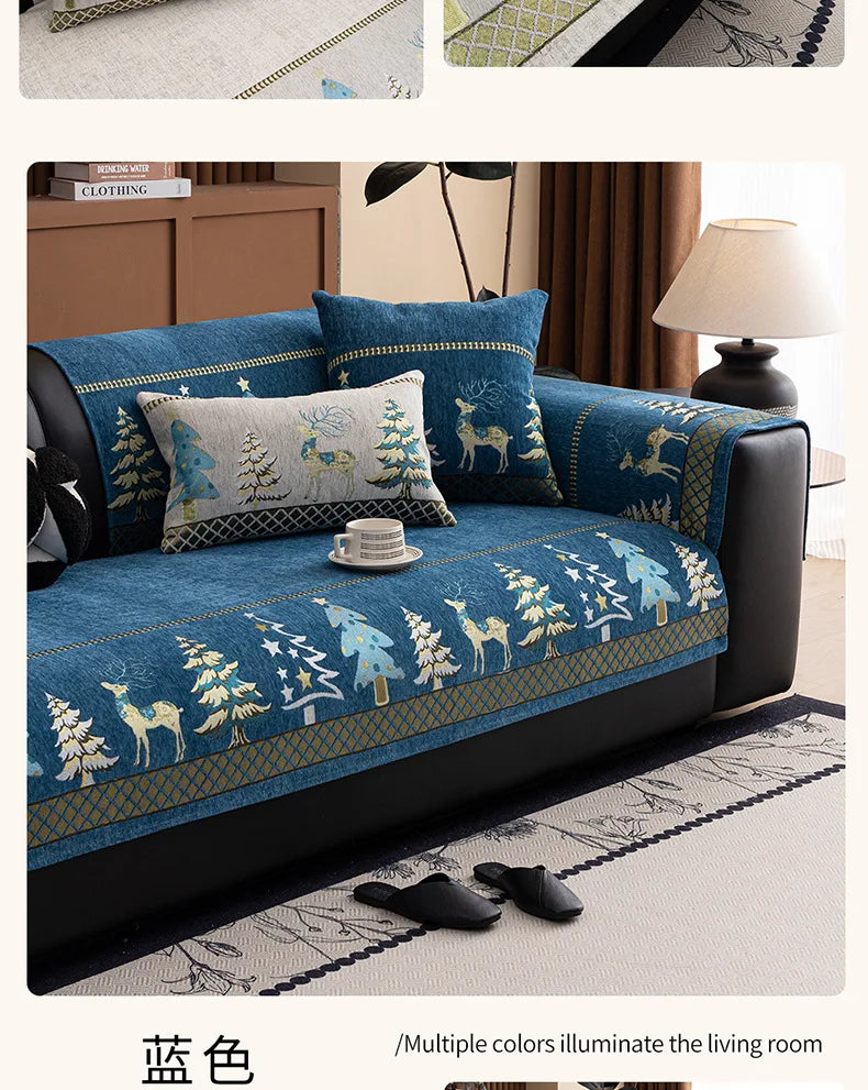 A dark blue sofa mat cover featuring a Christmas deer pattern and gold accents in a living room setting.