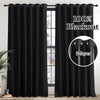 Blackout thermal curtain in black fabric hanging in a window frame