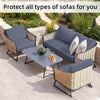 Gray outdoor wicker sofa cushion covers protecting various types of sofas in a garden setting.