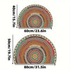 A half-round boho non-slip area rug featuring concentric circles of earthy tones and patterns.