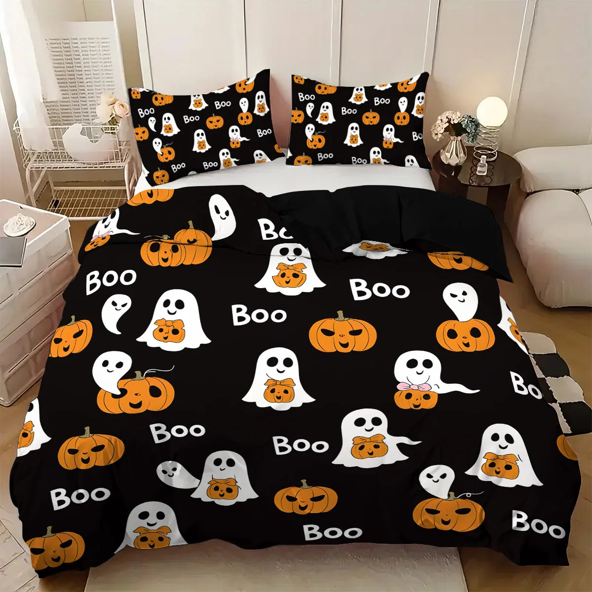 Black duvet cover set featuring an orange pumpkin and white ghost pattern