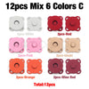 A collection of 12 metal magnetic snap buttons in six colors including white, red, pink, khaki, and orange.