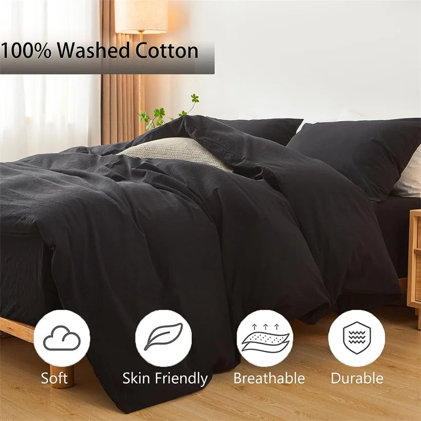Black 100% washed cotton duvet cover displayed on a bed with icons highlighting soft, skin friendly, breathable, and durable 