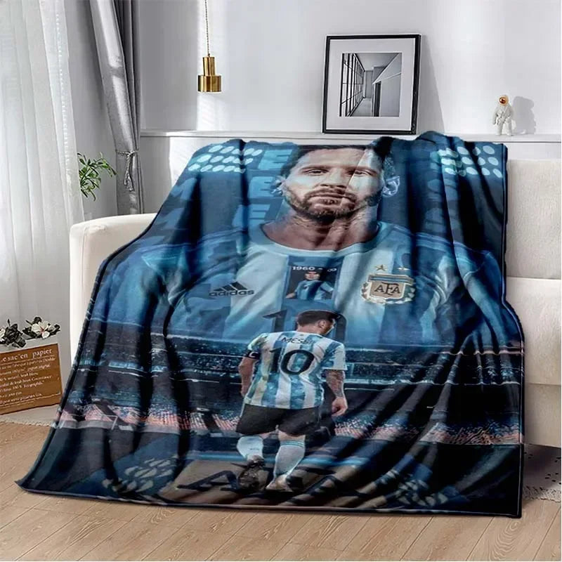 A dark blue and black blanket featuring a portrait of a football player in a jersey.
