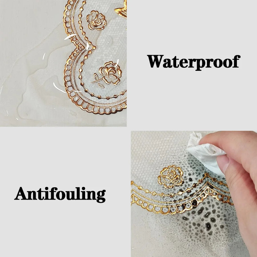 Close-up of a gold embroidered table cloth featuring floral patterns, highlighting its waterproof and antifouling properties.