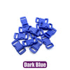 A pile of dark blue adjustable plastic paracord buckle bracelets.