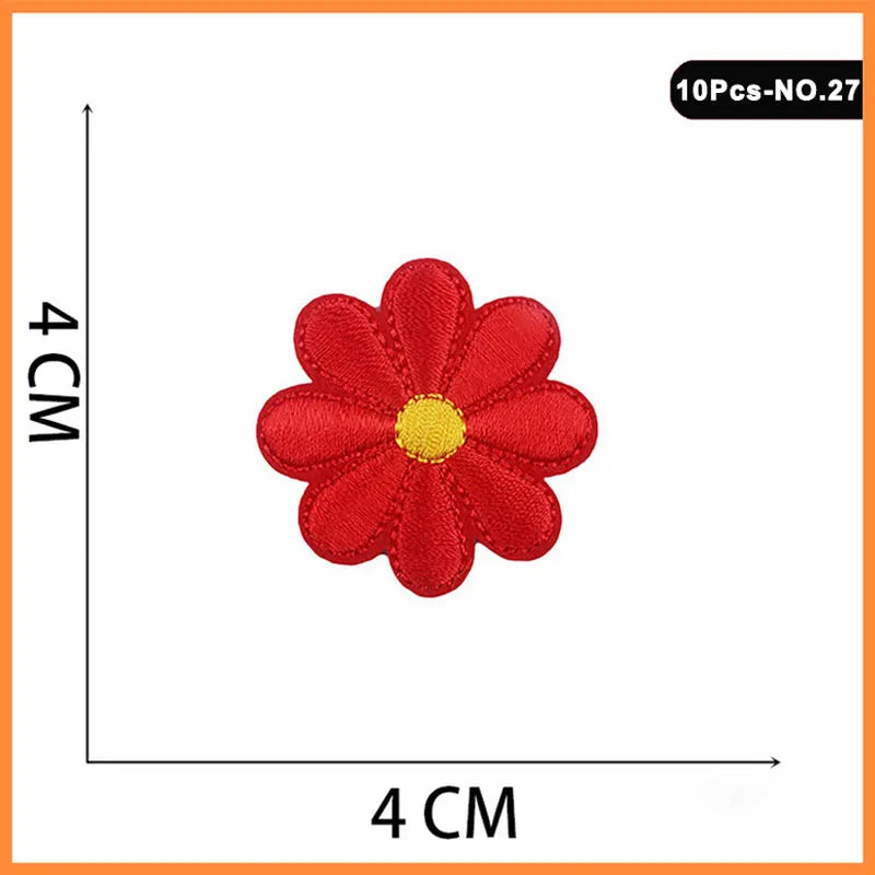 A set of ten embroidered iron-on patches featuring a red rose and butterfly design.