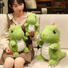 A young woman is holding several soft green dinosaur plush toys.