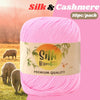 Pink silk and cashmere yarn skeins packaged for knitting and crochet projects