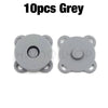Ten grey metal magnetic snap buttons for sewing