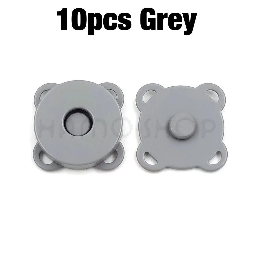 Ten grey metal magnetic snap buttons for sewing