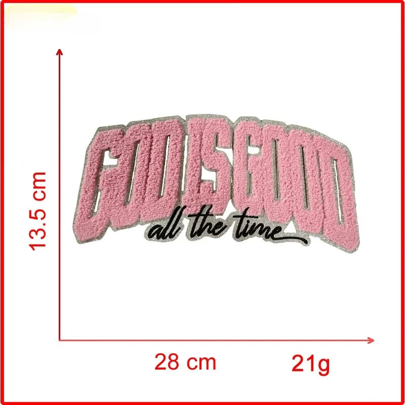 Pink felt embroidery patch spelling out GODSEED all the time