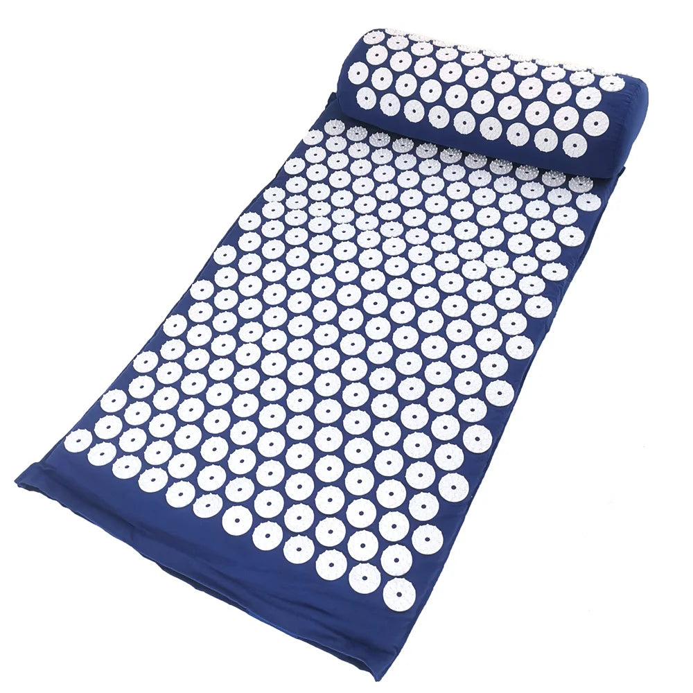 A dark blue acupressure relief mat and pillow set with white dots for pain and stress relief.