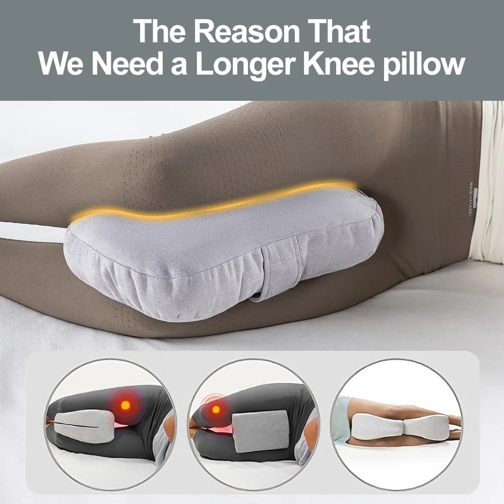 A gray ergonomic knee pillow is shown being used by a person lying on their side.